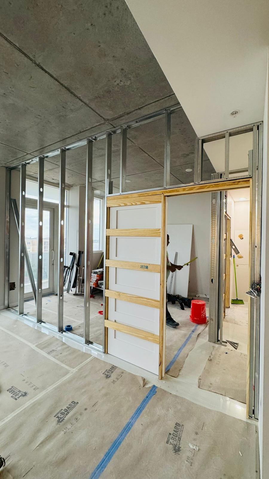 Marble shower black frame glass - LMV Construction