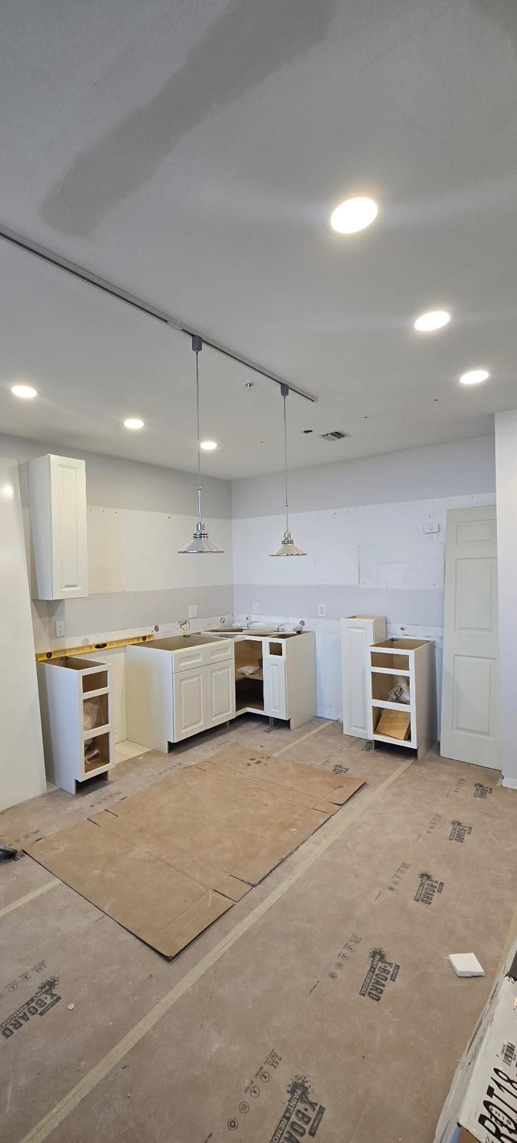 Custom stone fireplace floating shelves - LMV Construction