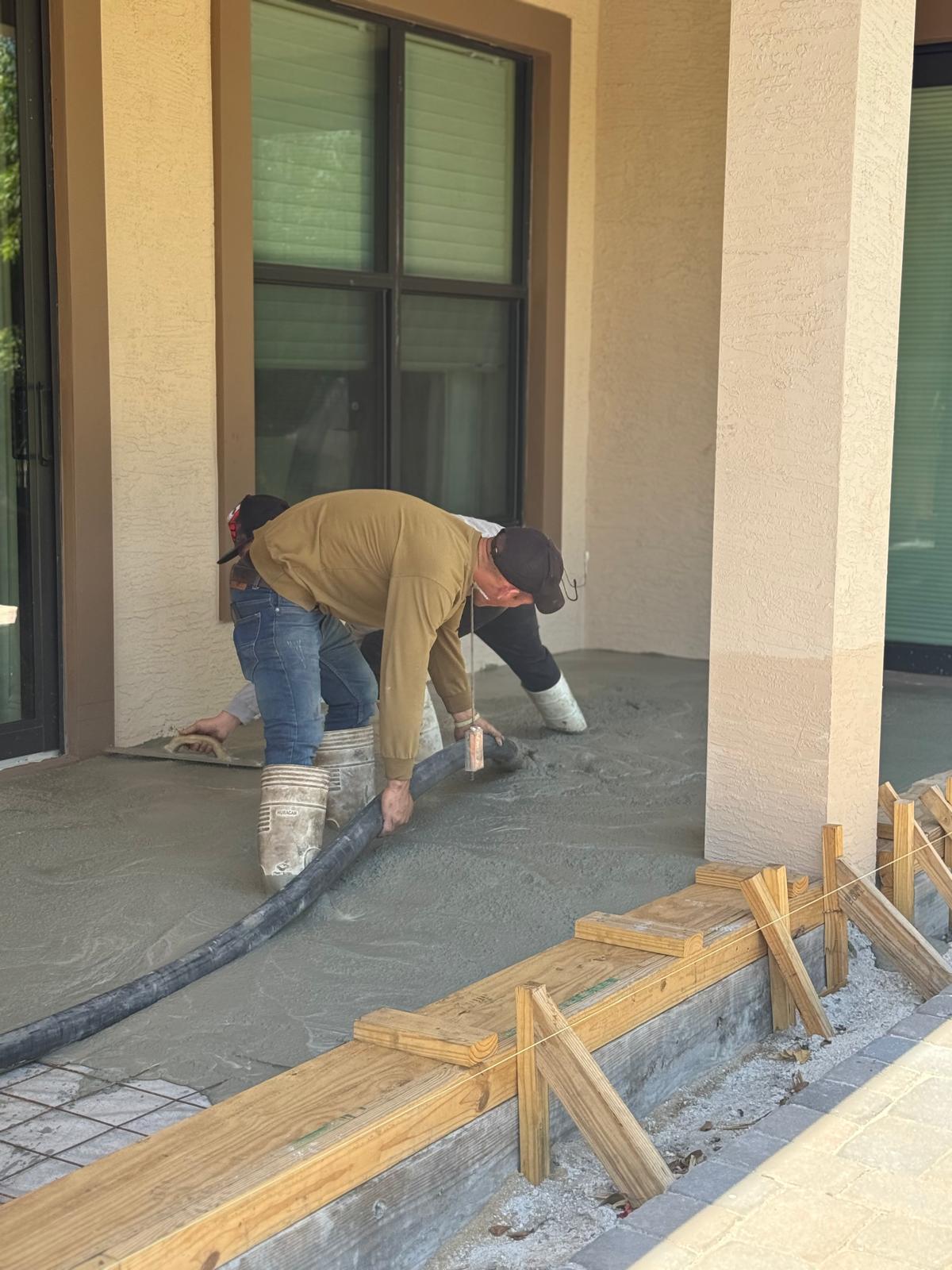 Concrete slab pour pump hose - LMV Construction